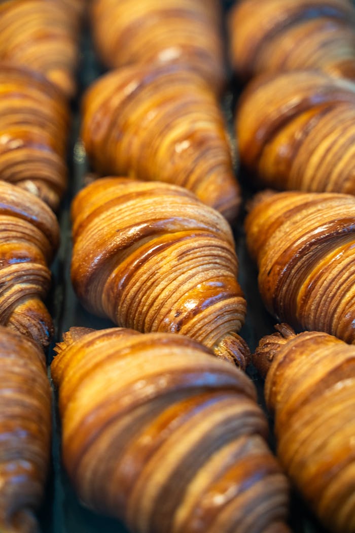 The Art of Drawing Readers In: Your attractive post title goes here Close-up shot of golden croissants in a Berlin bakery.