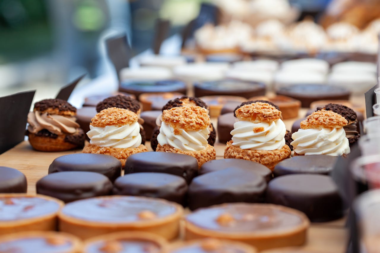 Mastering the First Impression: Your intriguing post title goes here A delectable array of gourmet pastries and desserts featuring creamy, chocolate, and nut toppings, perfect for indulgence.